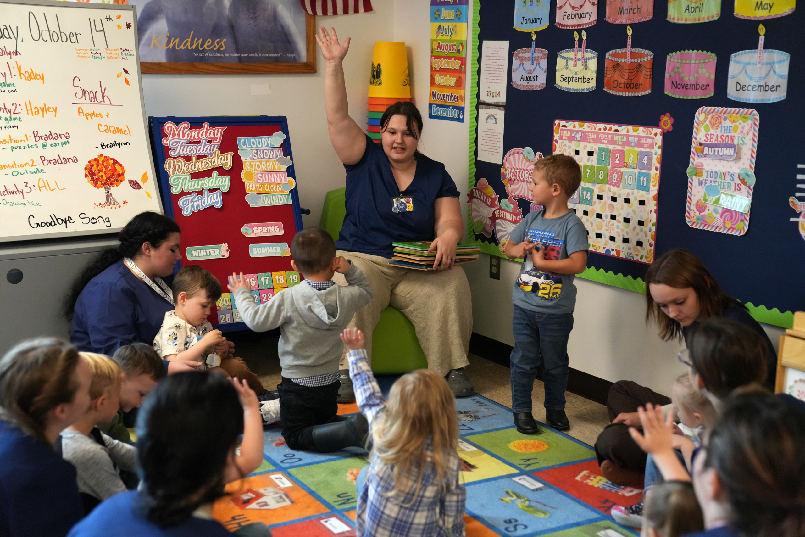 Photo of Young Professionals working with young minds