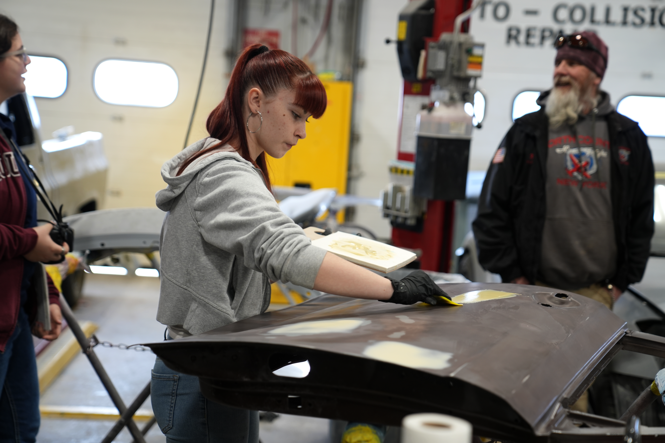 Photo of Young Professional learning skills in the Automotive Collision Repair Program
