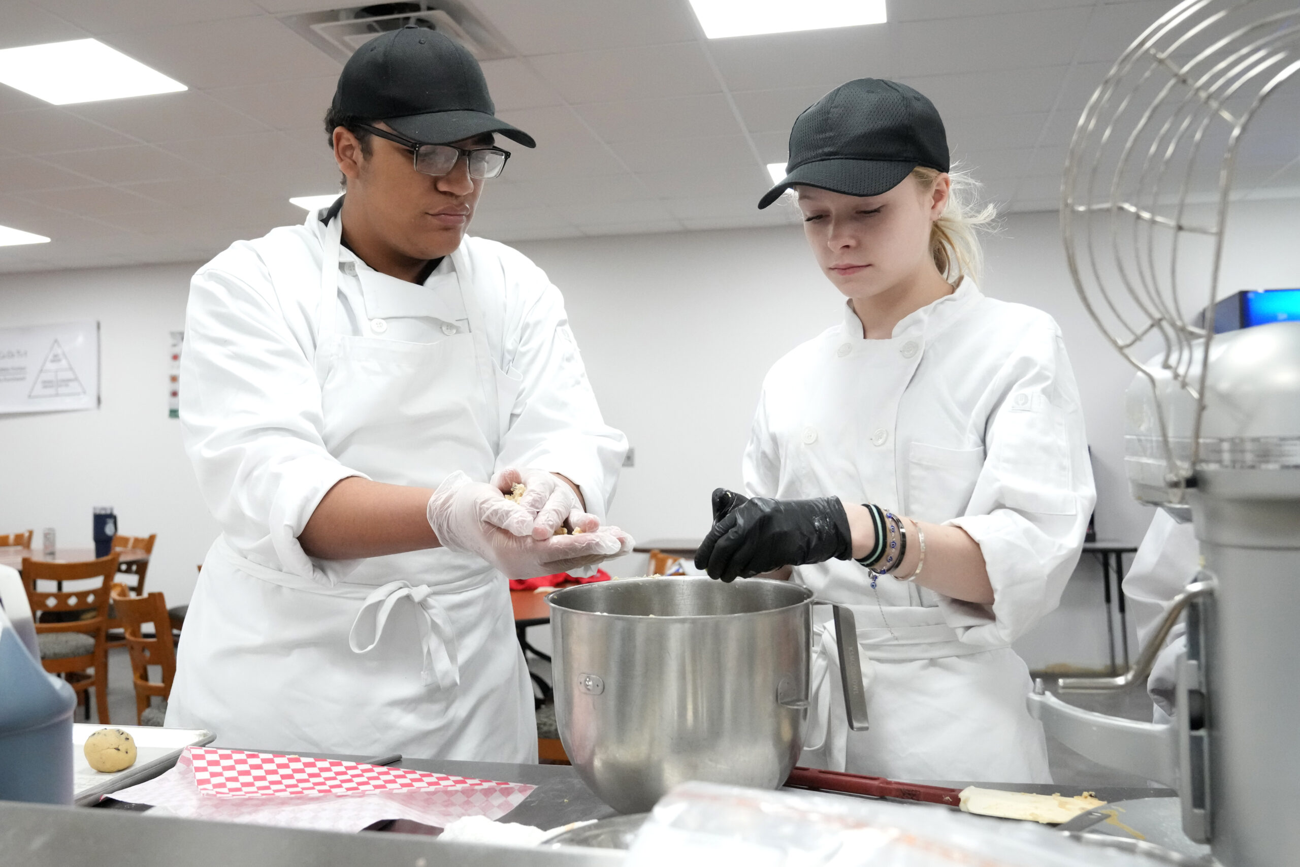 Photo of Young Professionals honing their craft in the Culinary Arts Management Program